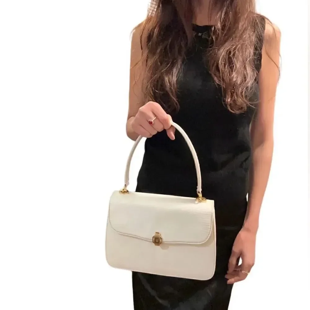 Gucci lizard embossed leather top handle tote